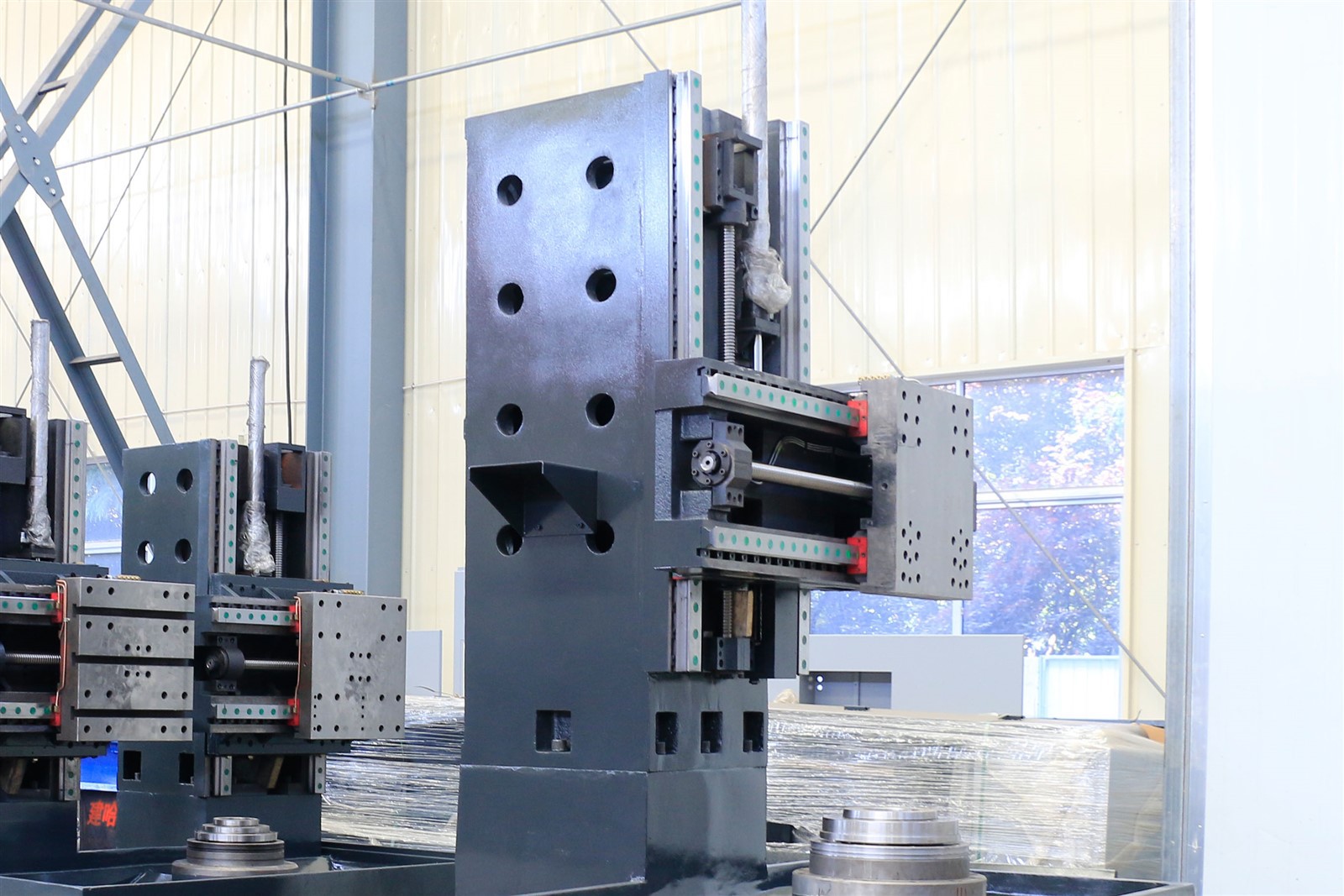 CNC vertical lathe with widened column CNC vertical lathe with widened column